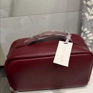 Burgundy Women's Bag make up bag 
With gold hardware- never been used